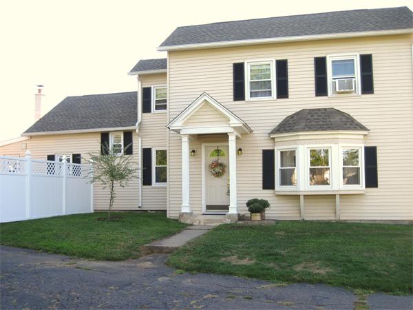 981 Tinkham Road Wilbraham, MA 01095 - Photo 1 of 21 a front view of a house with a yard