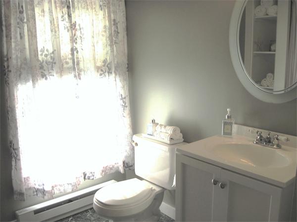 981 Tinkham Road Wilbraham, MA 01095 - Photo 14 of 21 a bathroom with a sink a toilet and a mirror