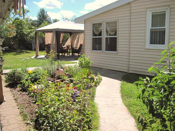 981 Tinkham Road Wilbraham, MA 01095 - Photo 16 of 21 a front view of a house with garden