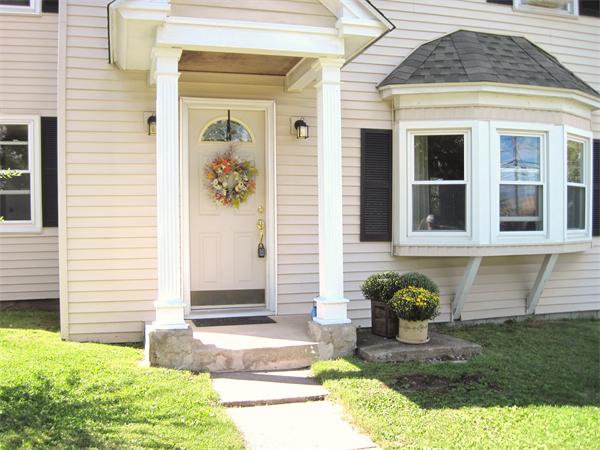 981 Tinkham Road Wilbraham, MA 01095 - Photo 2 of 21 a front view of a house with garden