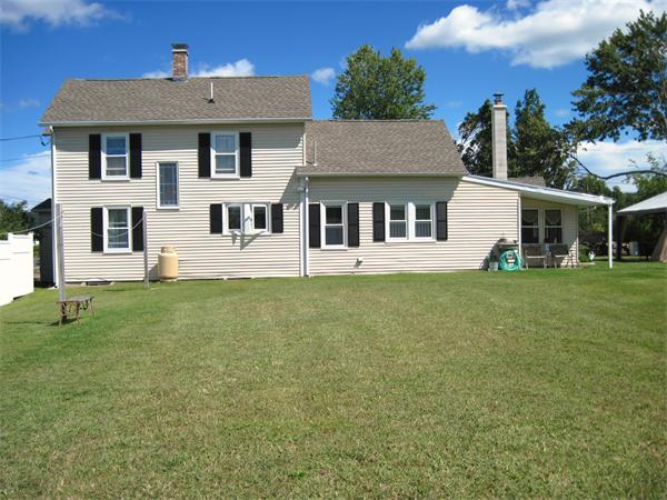 981 Tinkham Road Wilbraham, MA 01095 - Photo 21 of 21 a front view of a house with a yard