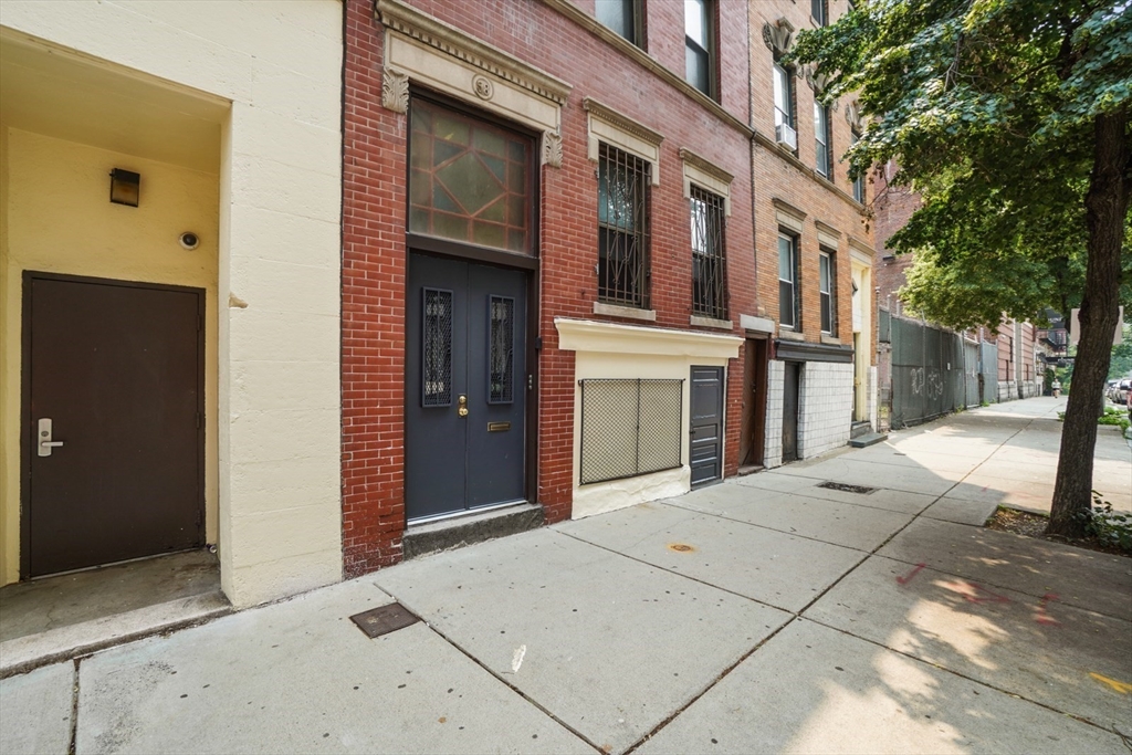 58 Charles Street South, Unit 2 Boston, MA 02116 - Photo 2 of 9 a view of a building with a outdoor space