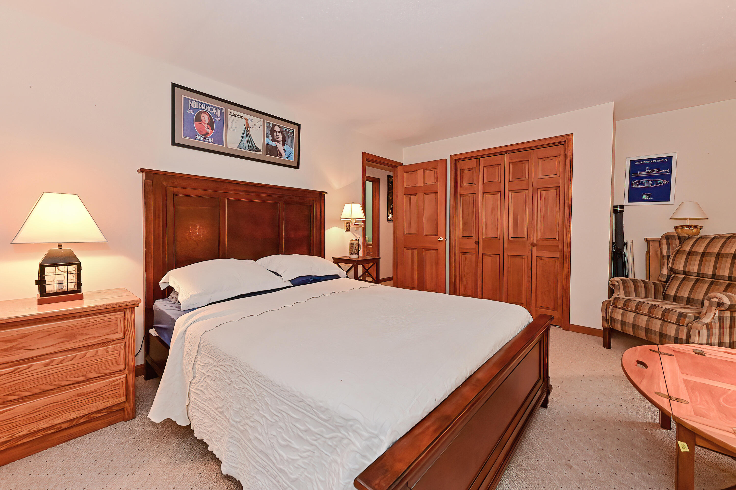 60 Grove Road Eastham, MA 02642 - Photo 17 of 39 a bedroom with a bed and a couch