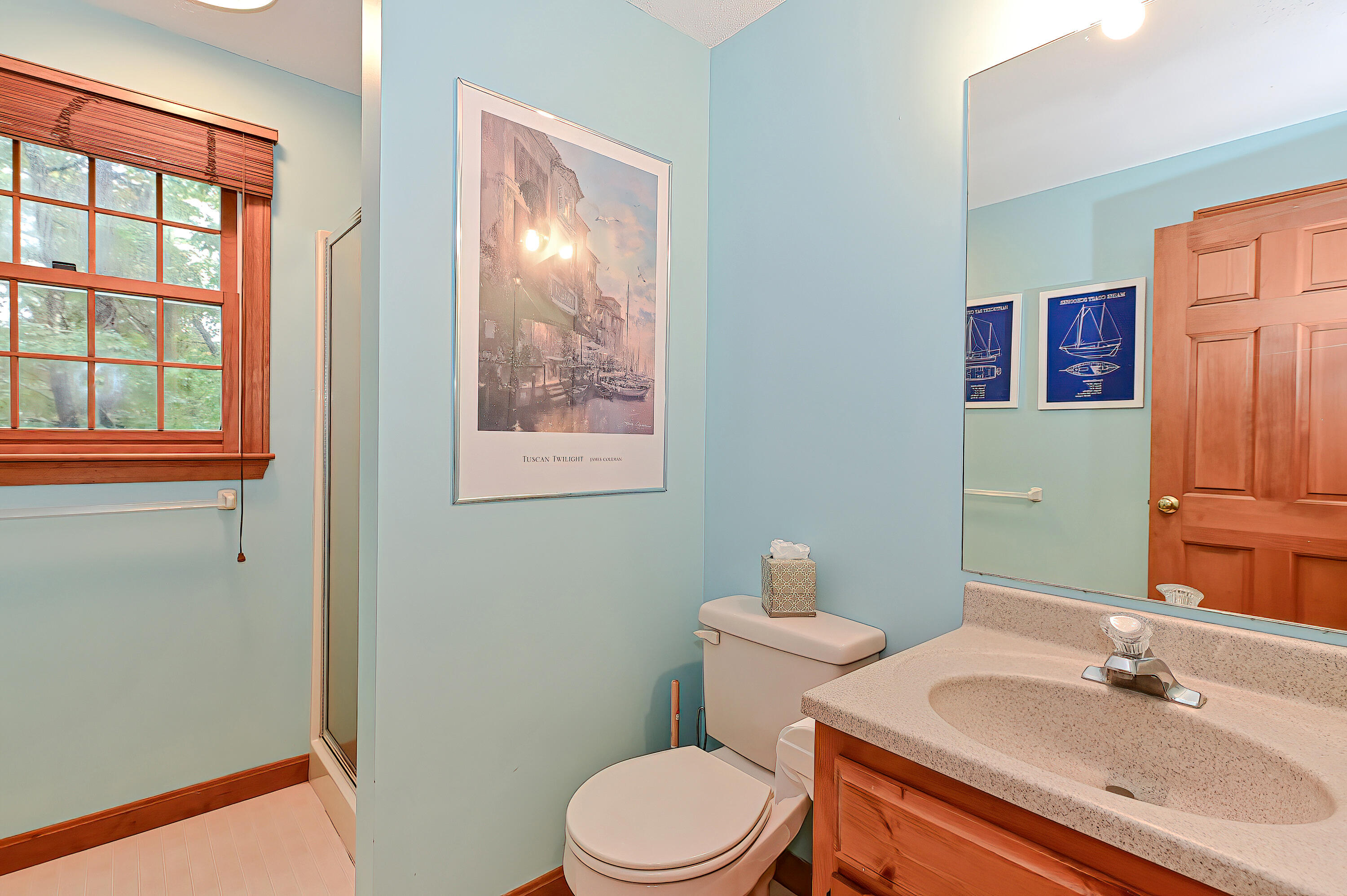 60 Grove Road Eastham, MA 02642 - Photo 19 of 39 a bathroom with a sink vanity mirror and toilet