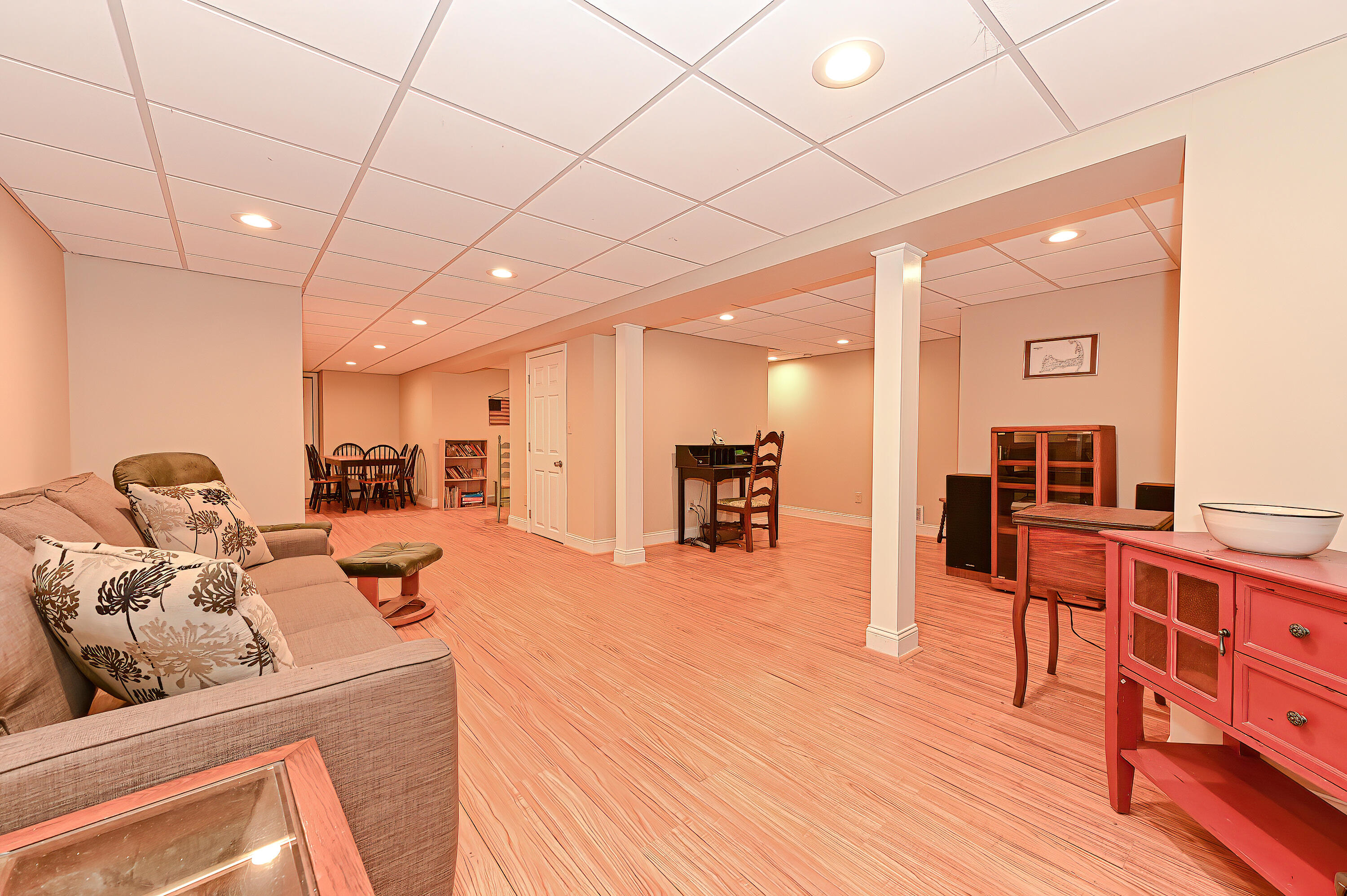 60 Grove Road Eastham, MA 02642 - Photo 31 of 39 a living room with furniture and a wooden floor