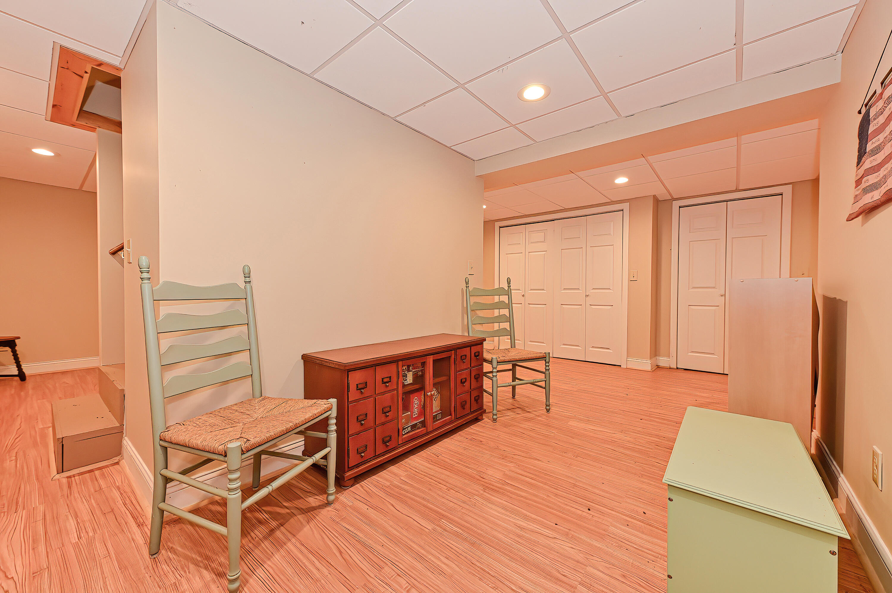 60 Grove Road Eastham, MA 02642 - Photo 34 of 39 a room with furniture and a wooden floor