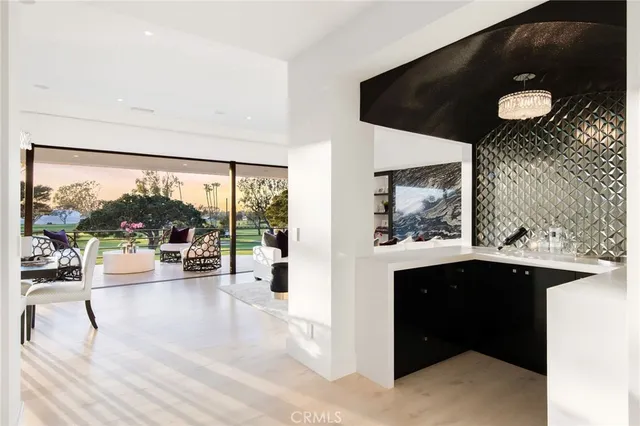 a view of living room with furniture and window
