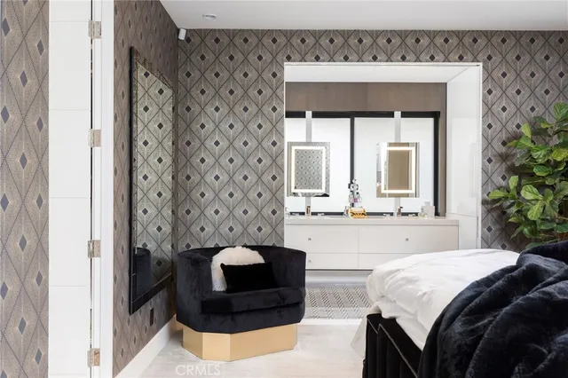 a spacious bedroom with a bed and a window