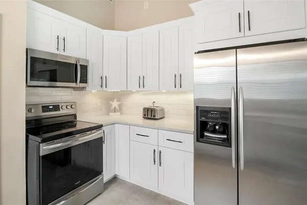 a bathroom with sink and mirror