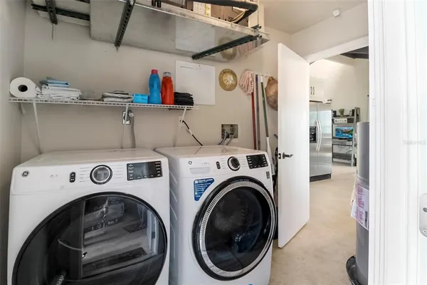 a view of a backyard with plants and a backyard