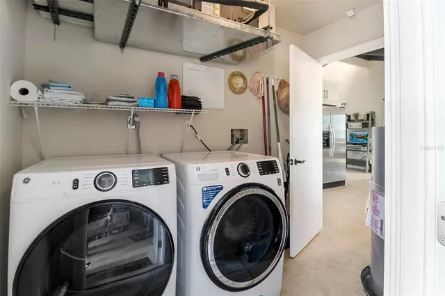 a view of a backyard with plants and a backyard