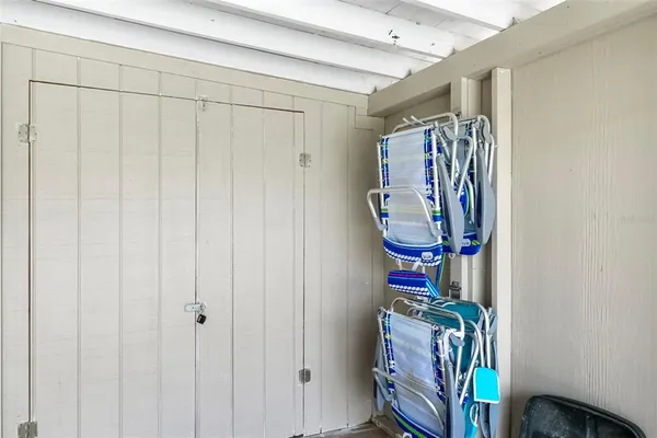 a view of entryway with shower and stairs