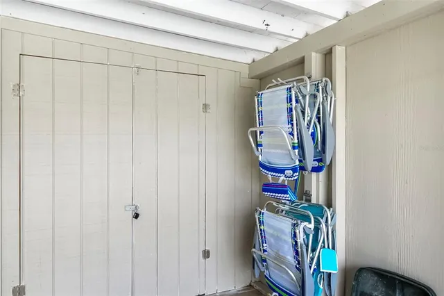 a view of entryway with shower and stairs