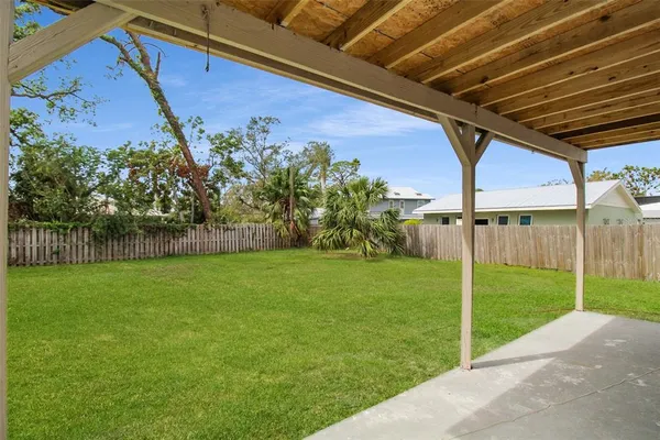 a view of a backyard with a garden