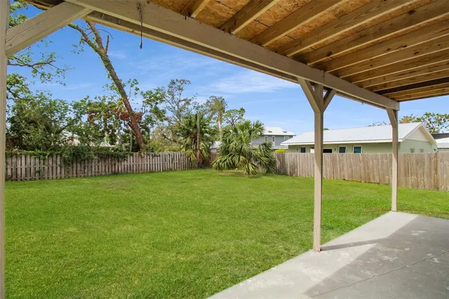 a view of a backyard with a garden