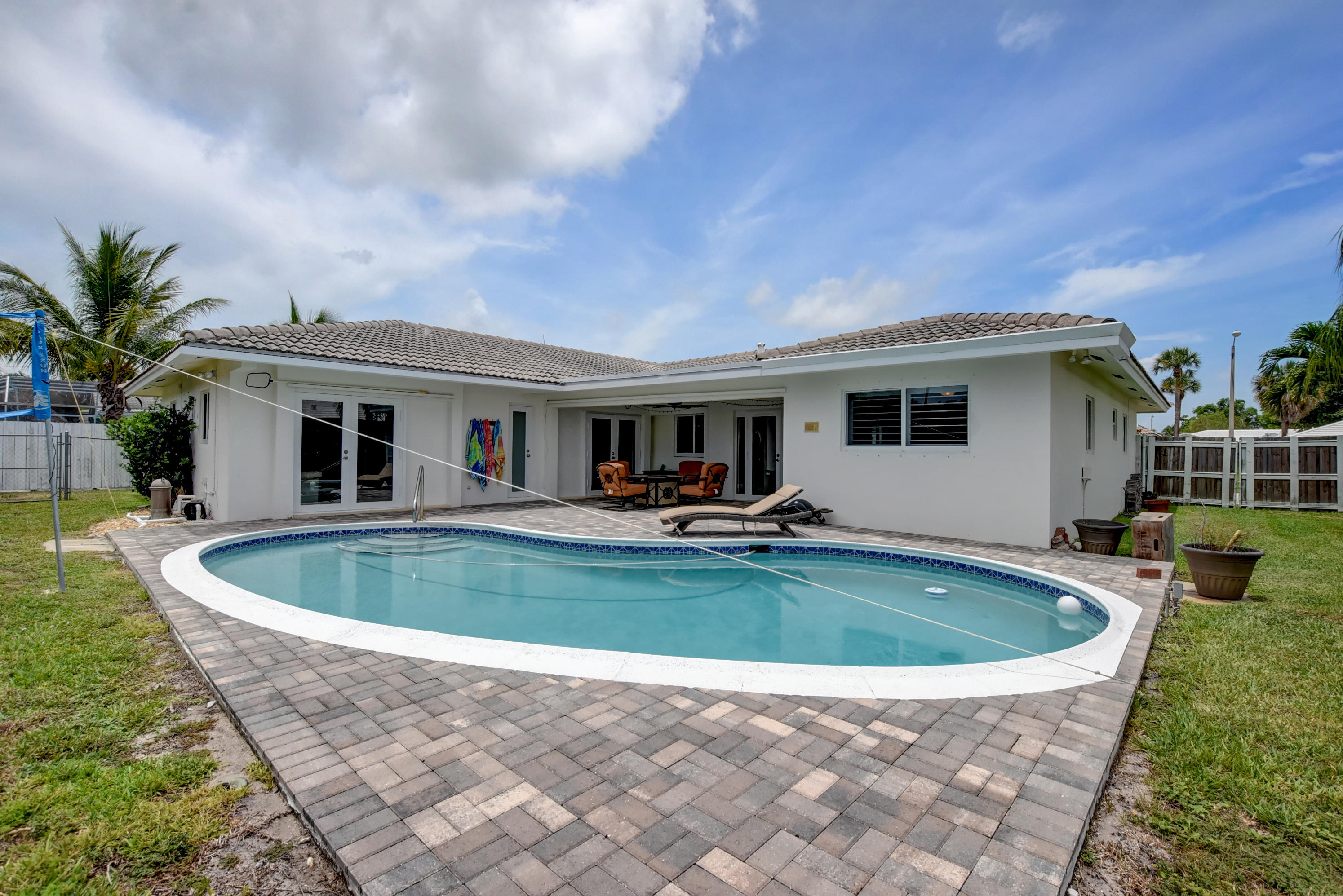 1366 Southwest 13th Place Boca Raton, FL 33486 - Photo 33 of 35 a view of outdoor space yard and swimming pool