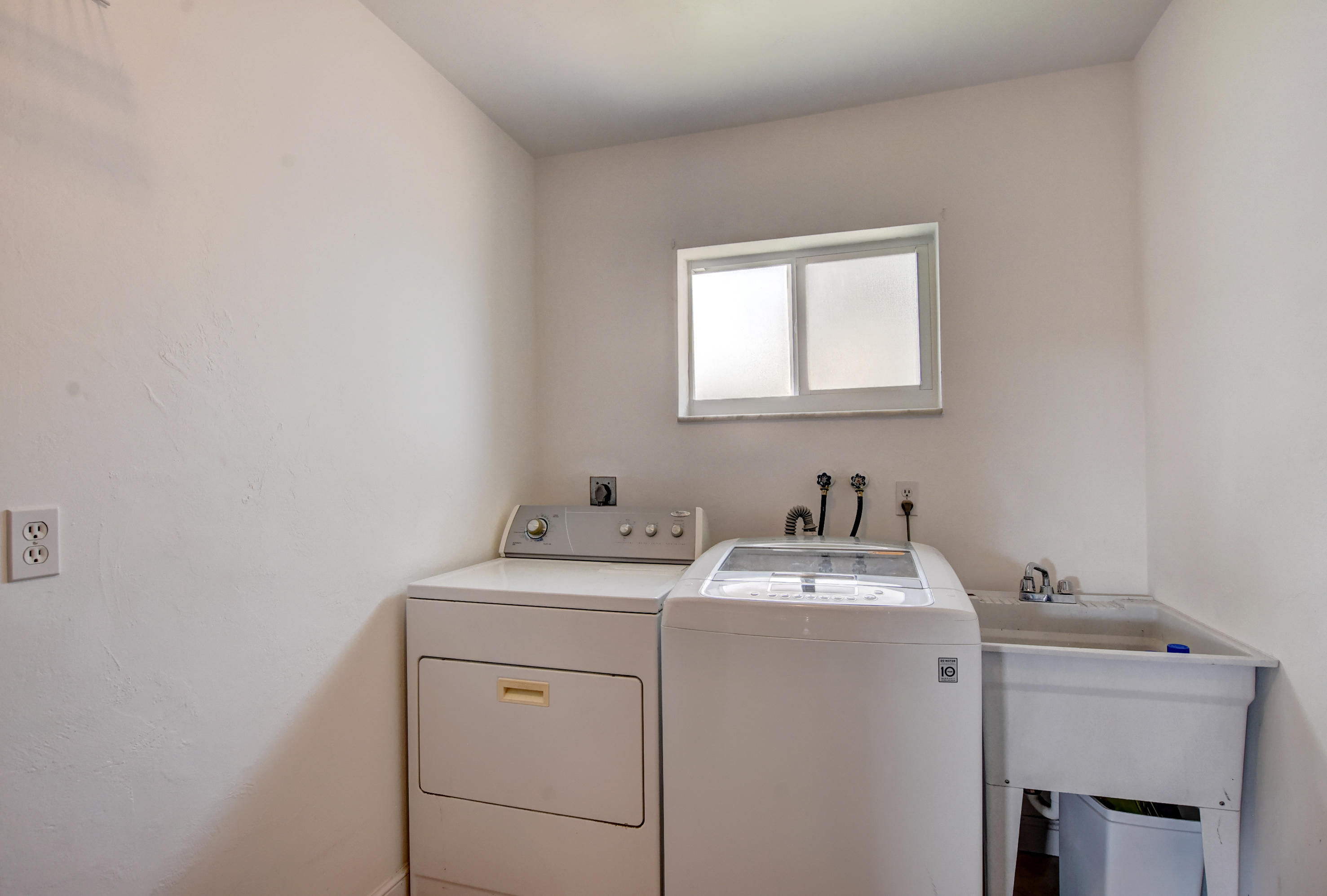 1366 Southwest 13th Place Boca Raton, FL 33486 - Photo 35 of 35 a utility room with dryer and washer