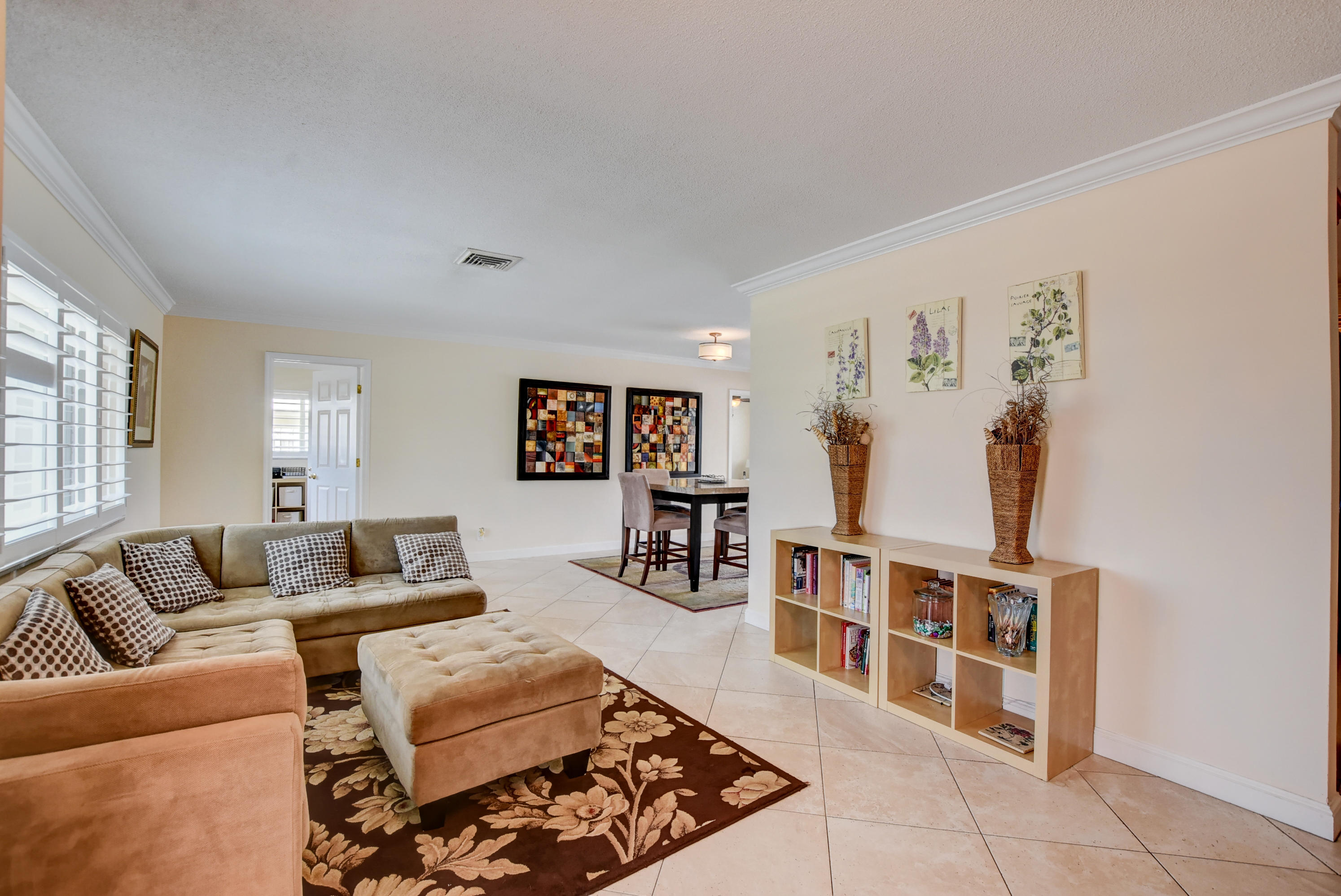 1366 Southwest 13th Place Boca Raton, FL 33486 - Photo 5 of 35 a living room with furniture and wooden floor
