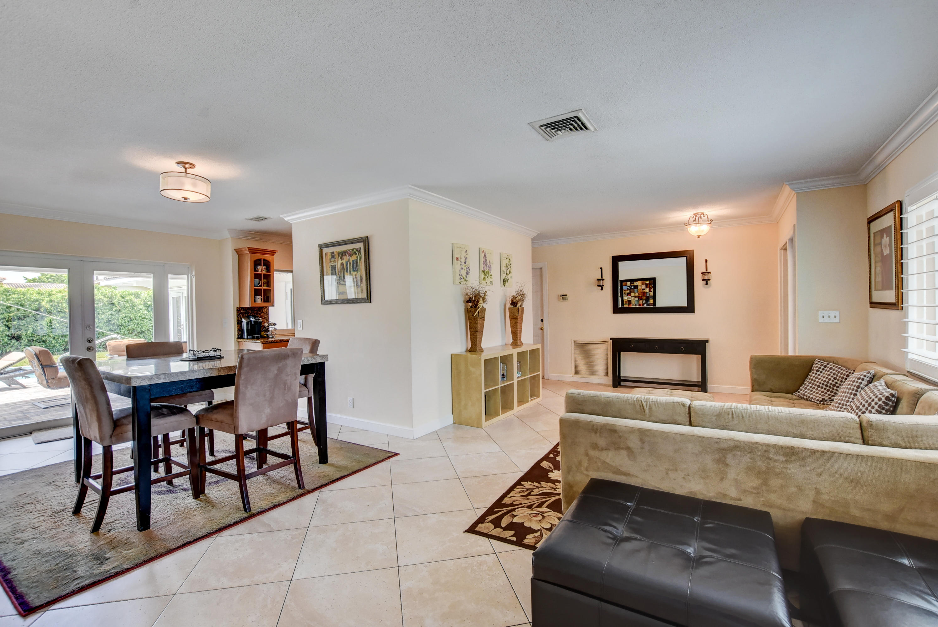 1366 Southwest 13th Place Boca Raton, FL 33486 - Photo 8 of 35 a living room with furniture and wooden floor