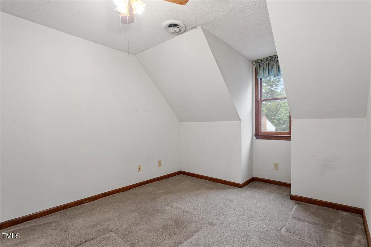 4616 Draper Road Raleigh, NC 27616 - Photo 21 of 34 an empty room with windows