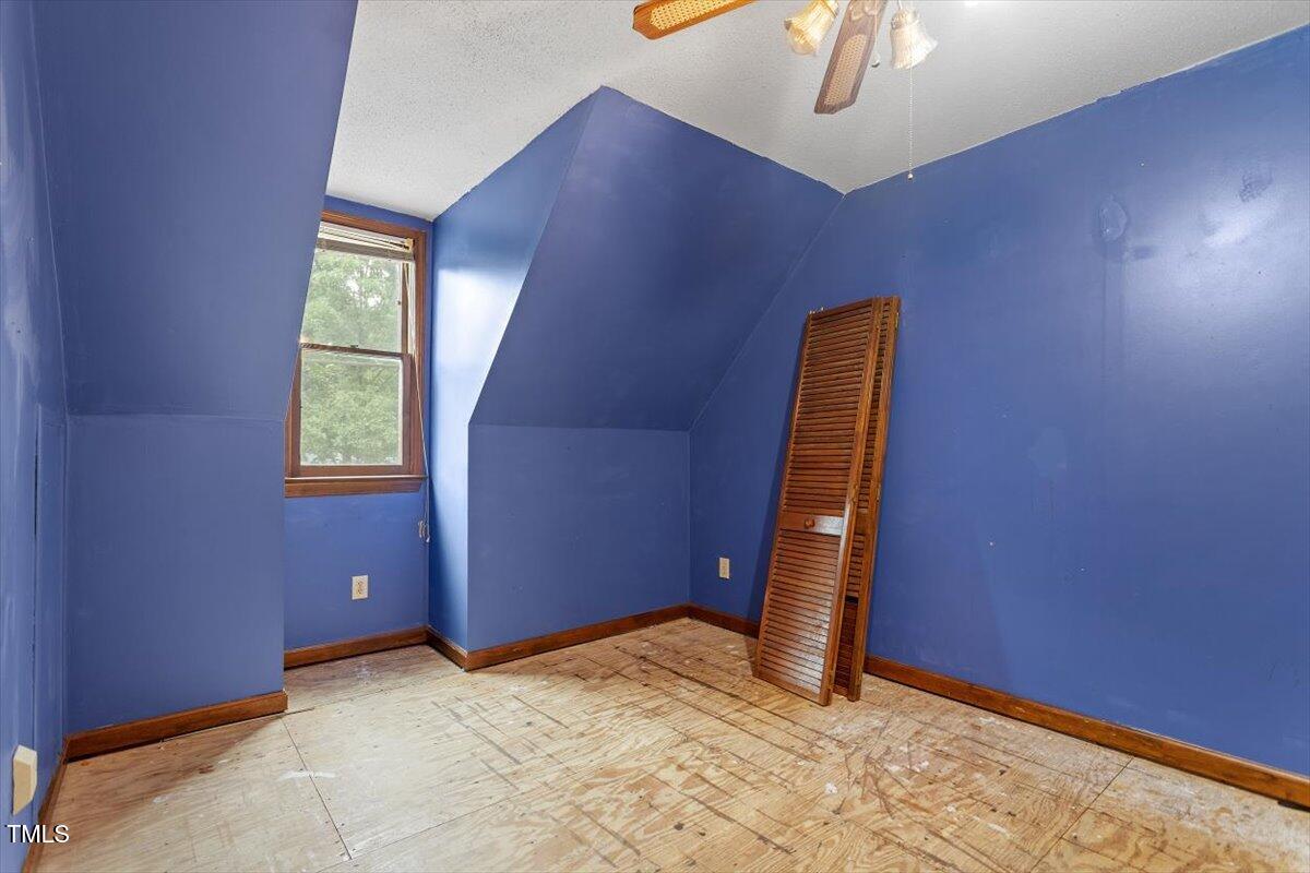 4616 Draper Road Raleigh, NC 27616 - Photo 24 of 34 a view of an empty room with windows