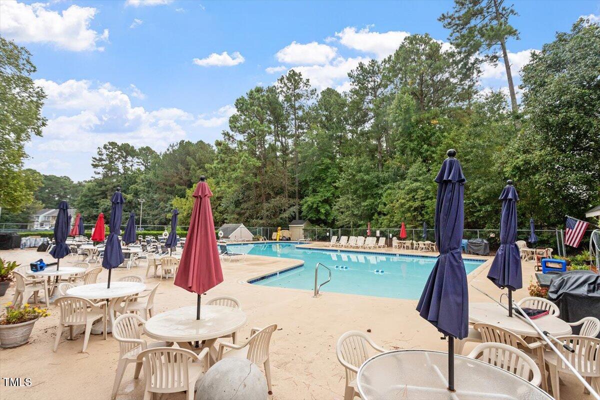 4616 Draper Road Raleigh, NC 27616 - Photo 31 of 34 a view of a backyard with sitting area
