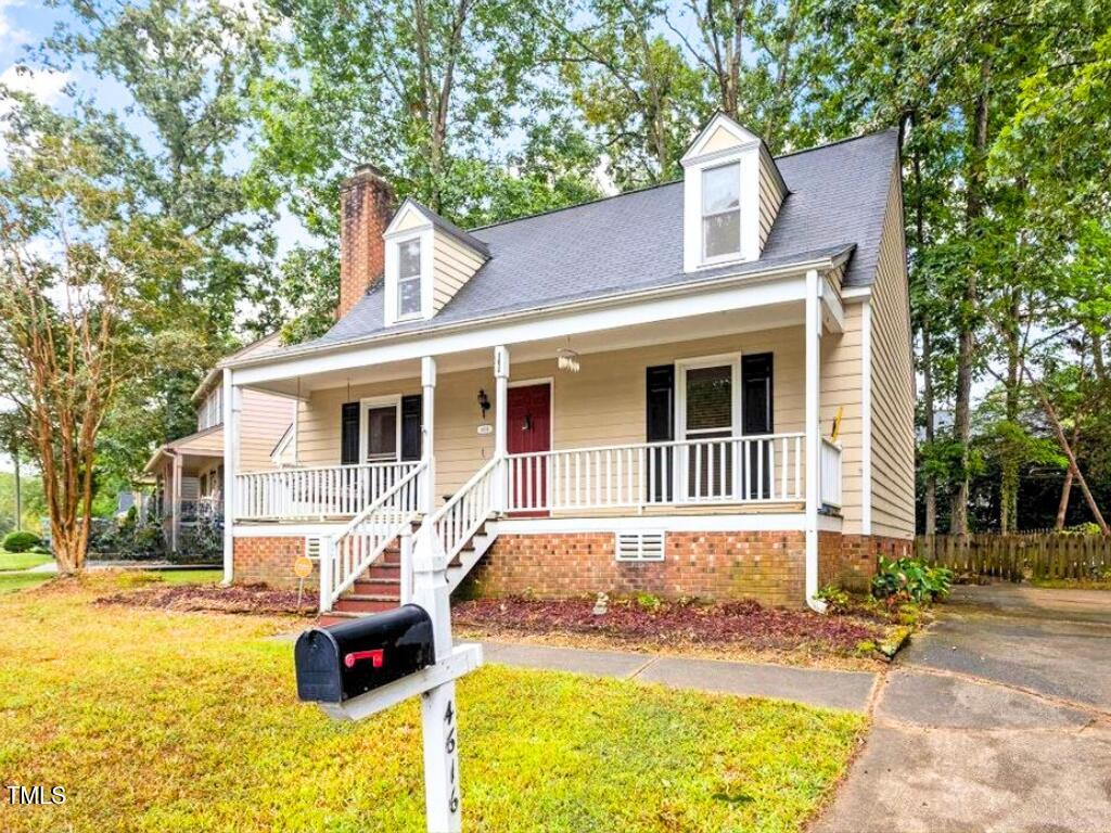 4616 Draper Road Raleigh, NC 27616 - Photo 3 of 34 a front view of a house with yard patio and swimming pool