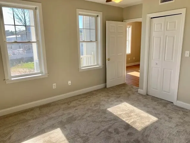 an empty room with windows