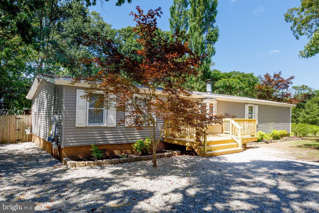 426 7th Street Somers Point, NJ 08244 - Photo 2 of 22 a view of a house with a patio