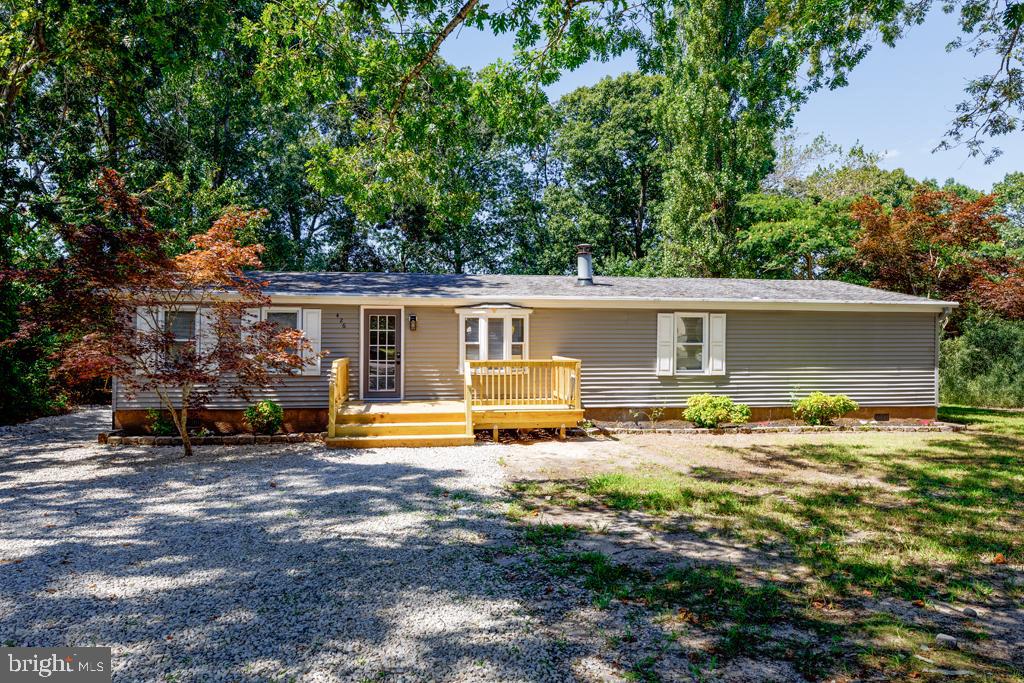 426 7th Street Somers Point, NJ 08244 - Photo 3 of 22 front view of a house with a patio