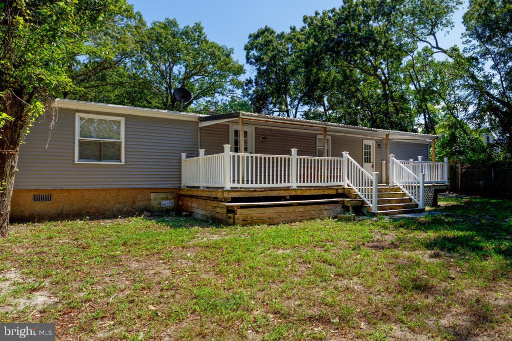 426 7th Street Somers Point, NJ 08244 - Photo 6 of 22 a view of backyard with a garden