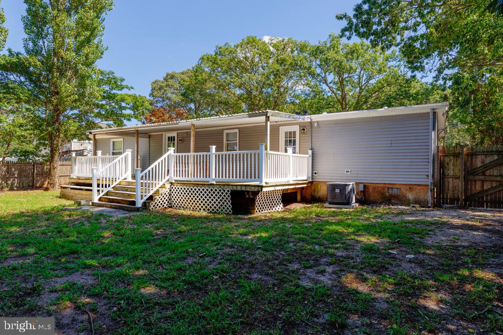 426 7th Street Somers Point, NJ 08244 - Photo 7 of 22 a view of a house with a yard