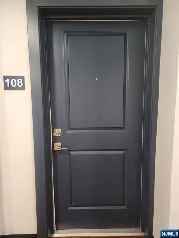 77 Ridge, Unit 108 North Arlington, NJ 07032 - Photo 3 of 24 a close view of cupboard