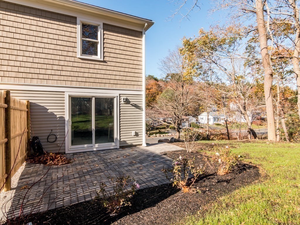 302 Western Avenue, Unit B Gloucester, MA 01930 - Photo 19 of 33 a view of a house with a yard