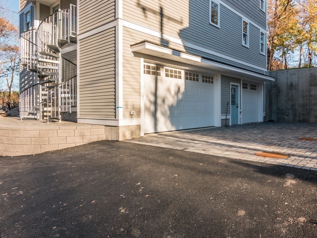 302 Western Avenue, Unit B Gloucester, MA 01930 - Photo 22 of 33 a view of a house with a street