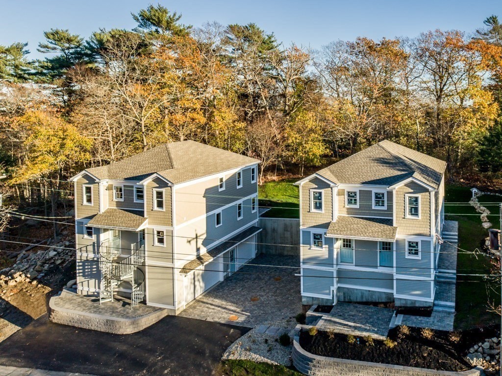 302 Western Avenue, Unit B Gloucester, MA 01930 - Photo 24 of 33 a front view of a house with a yard