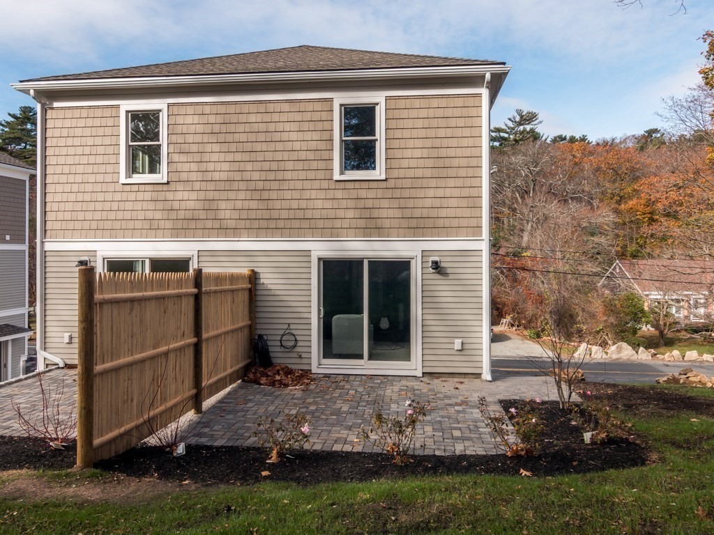 302 Western Avenue, Unit B Gloucester, MA 01930 - Photo 26 of 33 a view of a house with a yard