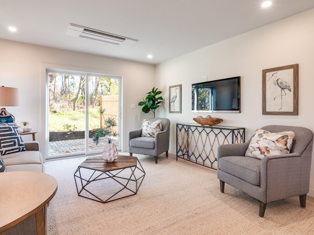 302 Western Avenue, Unit B Gloucester, MA 01930 - Photo 7 of 33 a living room with furniture and a large window
