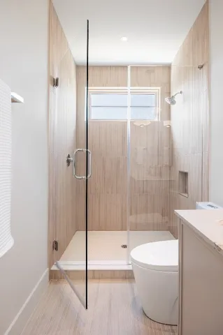 a bathroom with a shower and a bathtub
