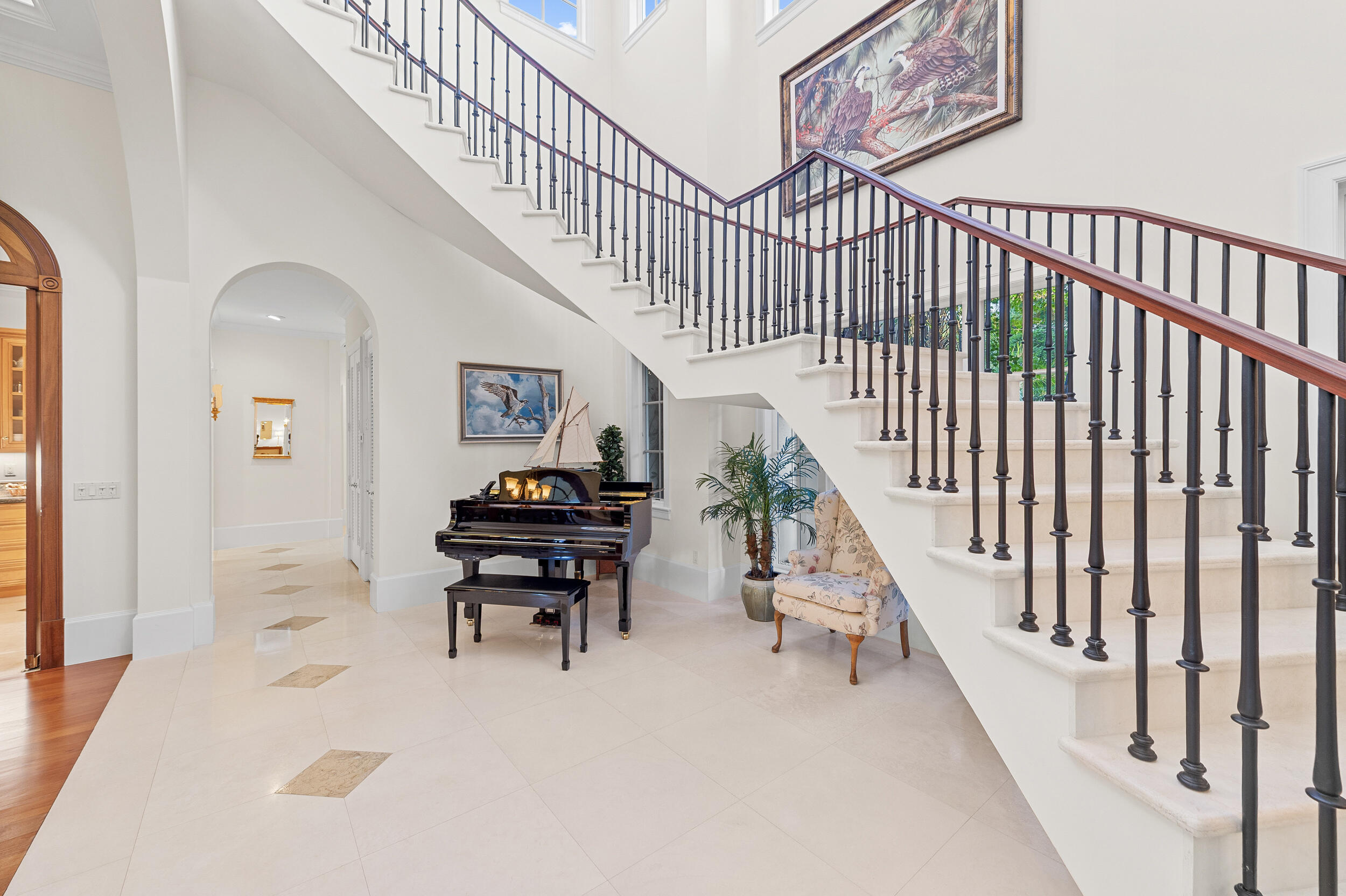 6968 Southeast Harbor Circle Stuart, FL 34996 - Photo 13 of 40 a view of entryway with wooden floor and a front door