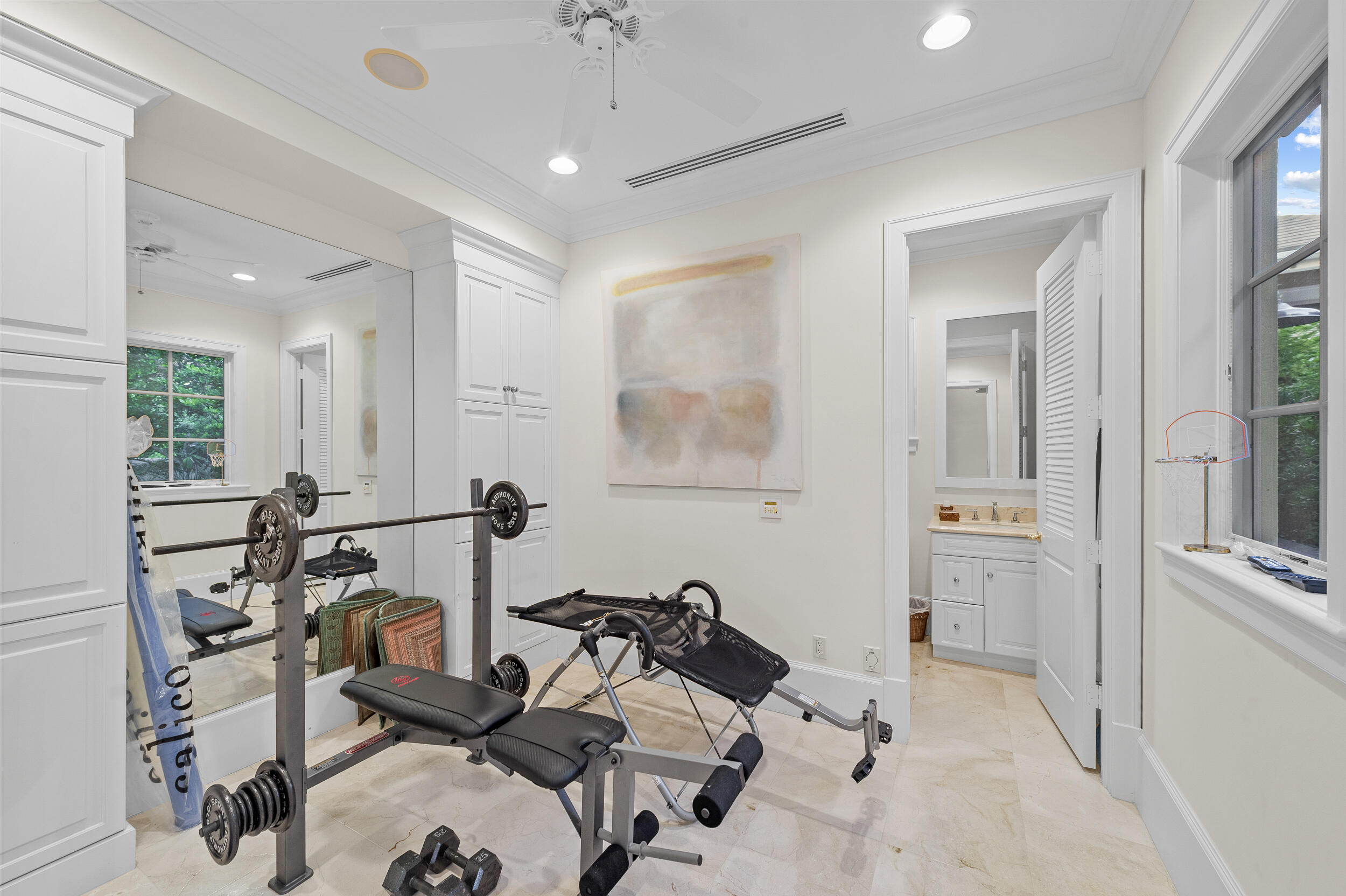 6968 Southeast Harbor Circle Stuart, FL 34996 - Photo 29 of 40 a view of a room with gym equipment