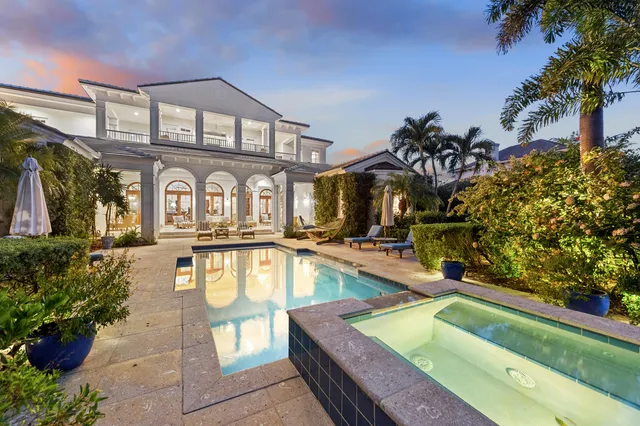 a view of a house with swimming pool