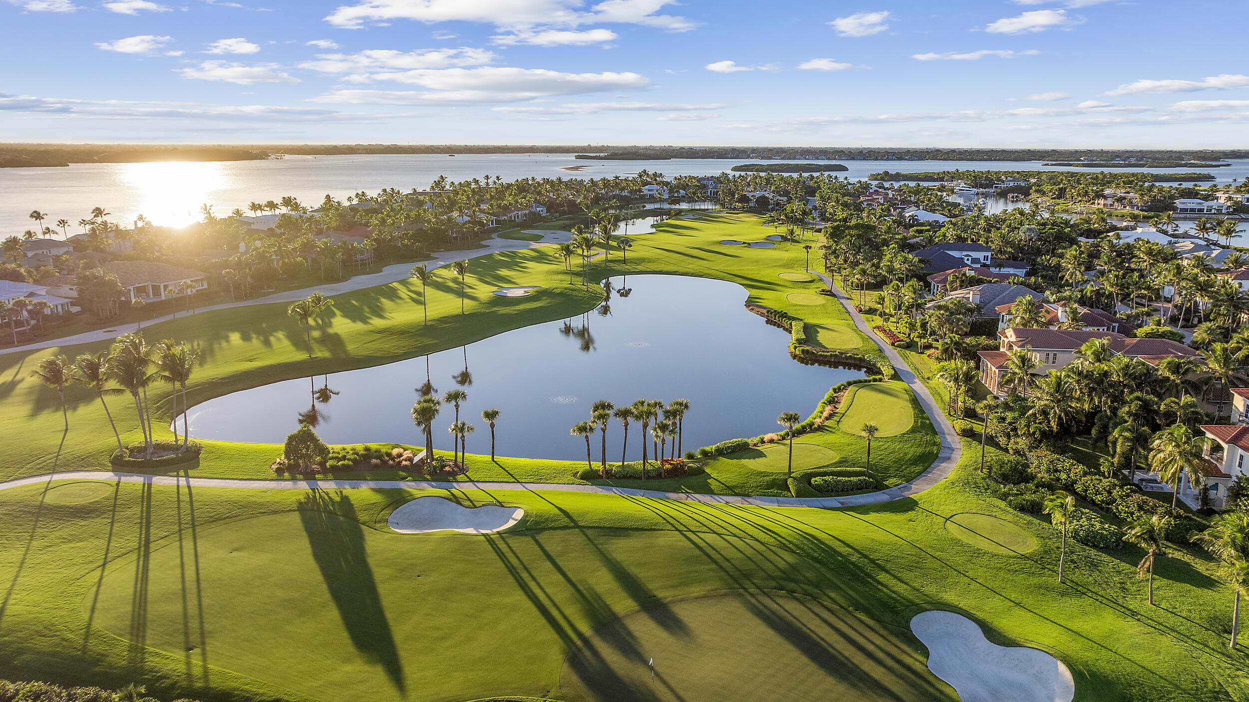 6968 Southeast Harbor Circle Stuart, FL 34996 - Photo 39 of 40 a view of a swimming pool with an ocean view