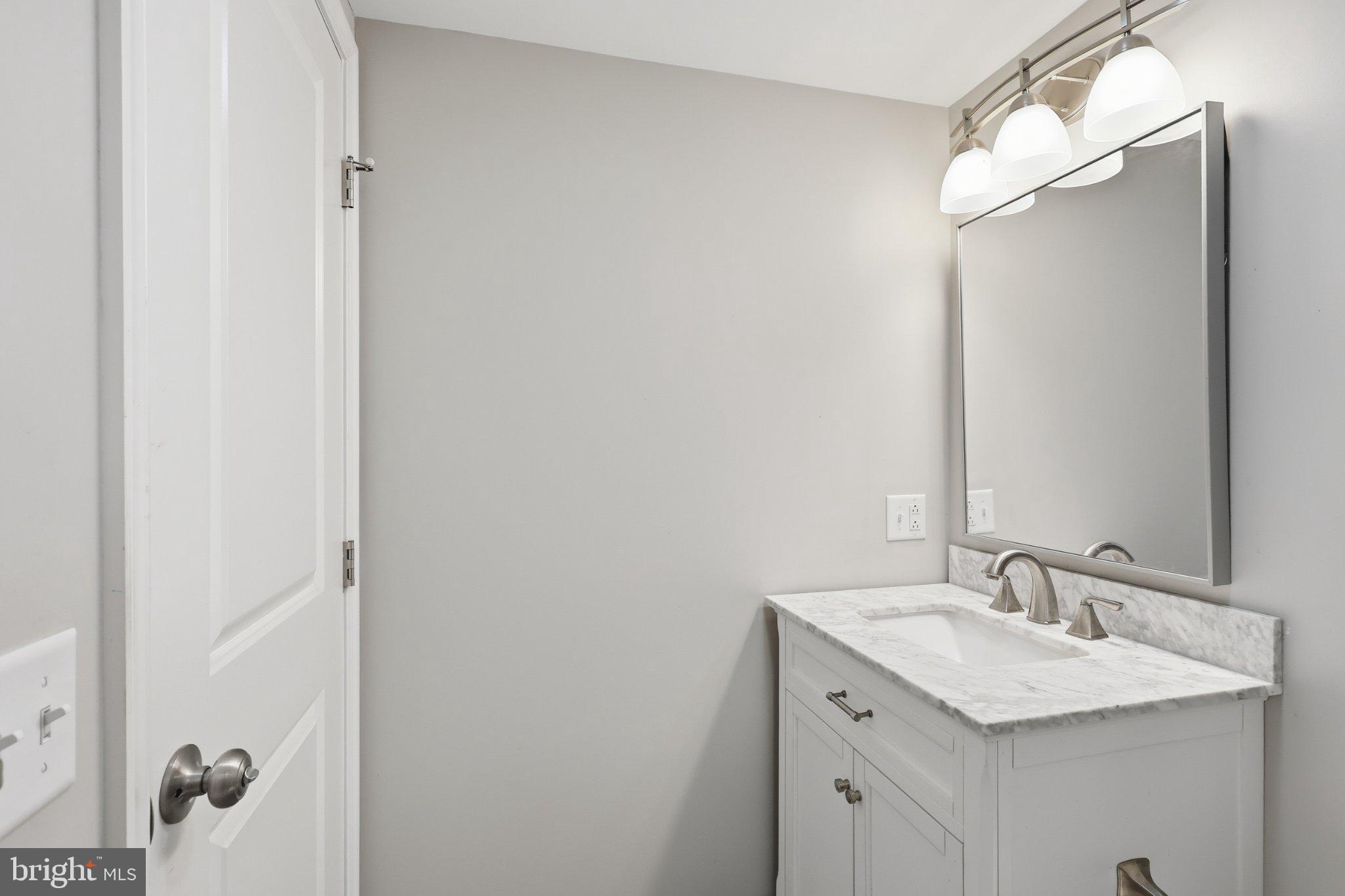 125 Ashland Drive Ridgeley, WV 26753 - Photo 18 of 41 Sleek modern bathroom with elegance.