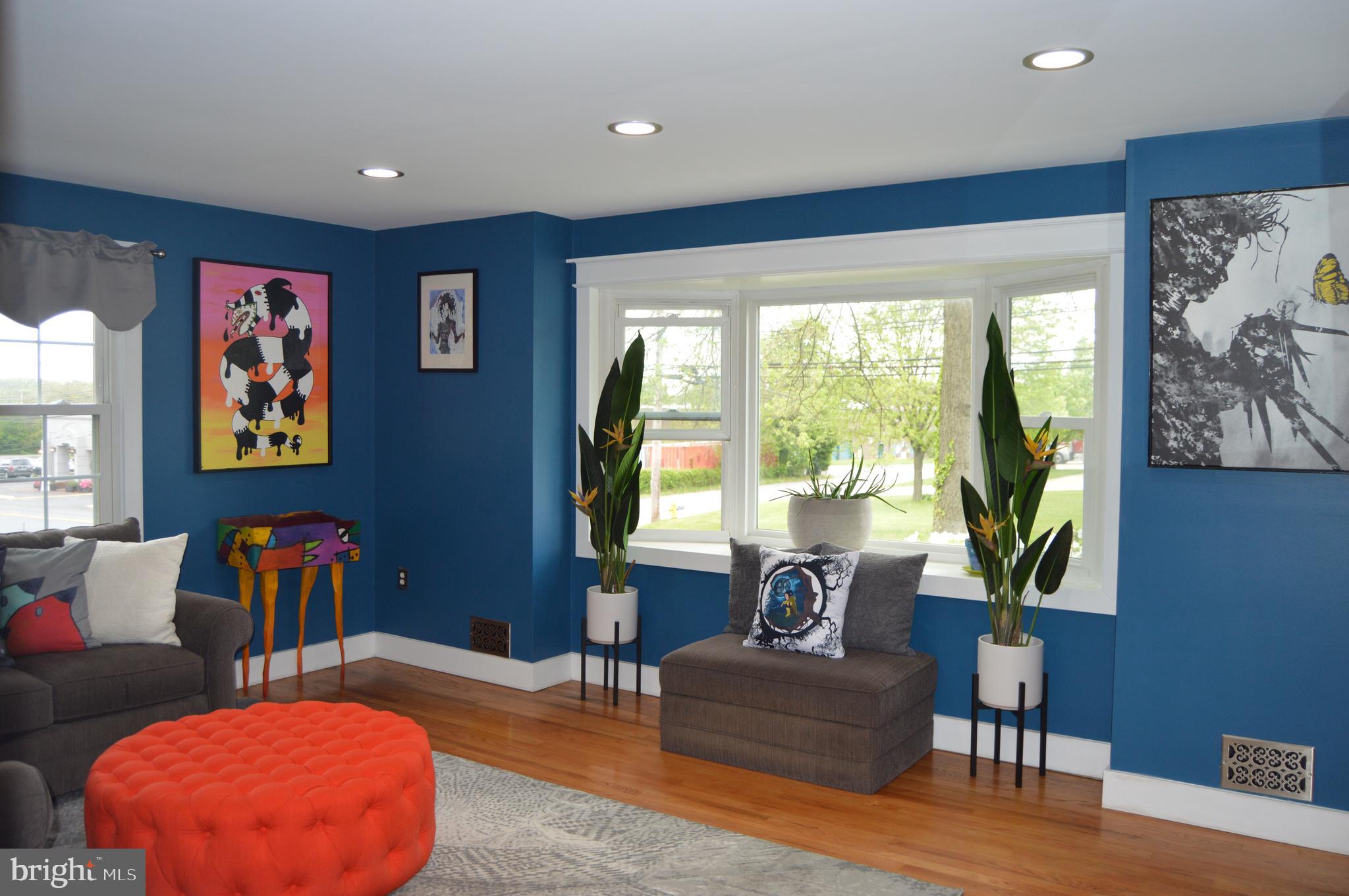 630 North Hammonds Ferry Road Linthicum, MD 21090 - Photo 6 of 26 Gleaming Wood Floors and Bow Window in Living Room