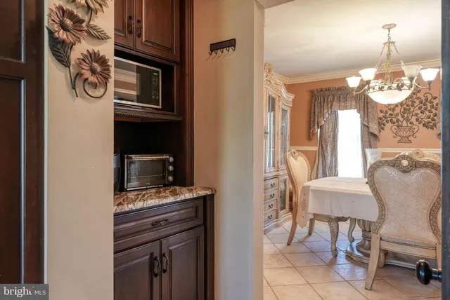 a view of a kitchen from the hallway