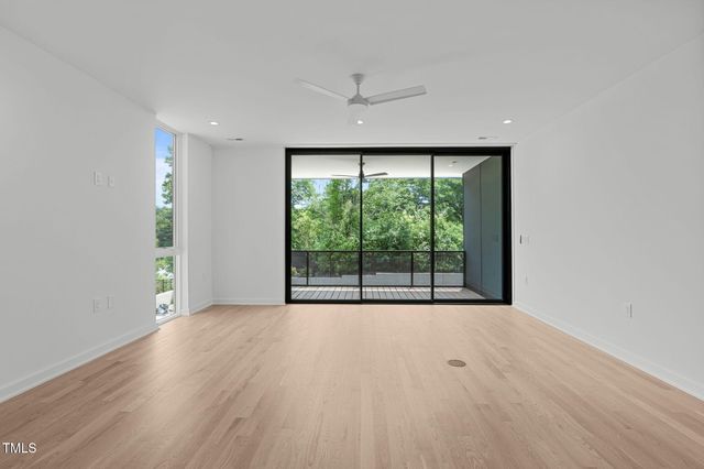 a view of a room with a large window