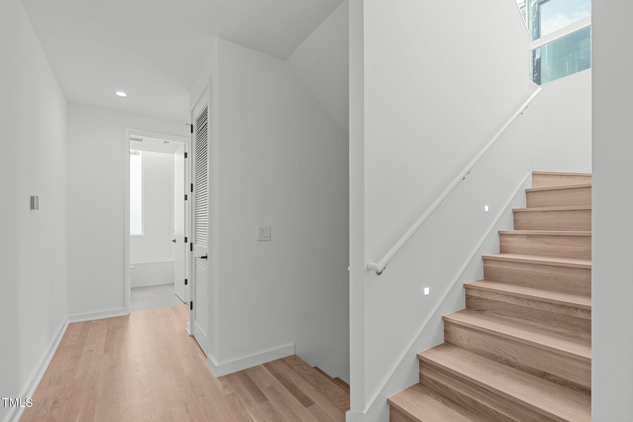 511 South Bloodworth Street, Unit 101 Raleigh, NC 27601 - Photo 18 of 51 a view of an entryway with wooden floor