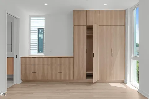 a bathroom with a double vanity sink mirror and double