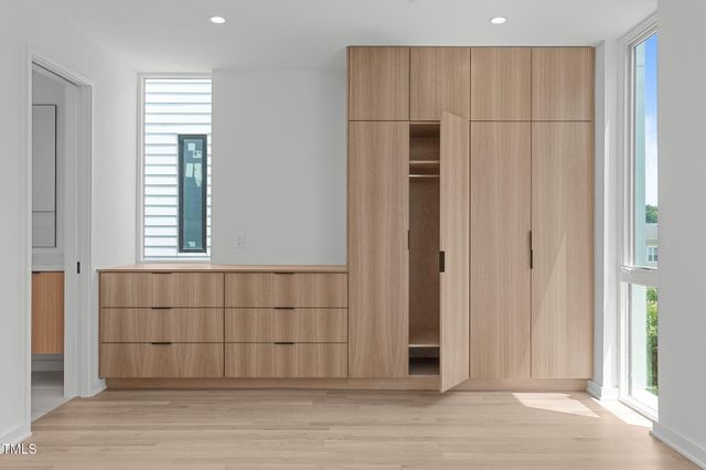 a bathroom with a double vanity sink mirror and double